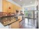 Well-appointed kitchen featuring granite countertops, stainless steel appliances, and ample cabinet space at 562 New Bern Station Ct, Charlotte, NC 28209