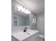 Bathroom features a large mirror and modern vanity with sleek black faucet at 600 Burns St, Wadesboro, NC 28170