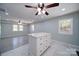Spacious kitchen area featuring an island, neutral paint, and natural light from the windows at 600 Burns St, Wadesboro, NC 28170