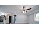 Open-concept kitchen area featuring stainless steel appliances and eat in area with windows at 600 Burns St, Wadesboro, NC 28170