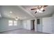 Spacious living room with recessed lighting, ceiling fan, and large windows for abundant natural light at 600 Burns St, Wadesboro, NC 28170