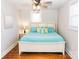 Cozy bedroom featuring hardwood floors and two windows for plenty of light at 606 Childs St, Lincolnton, NC 28092