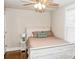 Bright bedroom featuring neutral walls, a ceiling fan, and a window for natural light at 606 Childs St, Lincolnton, NC 28092