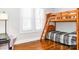 Bedroom featuring a bunkbed, a desk, and hardwood floors at 606 Childs St, Lincolnton, NC 28092
