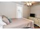 Cozy bedroom featuring a comfortable bed, soft pillows, and a dresser with a TV at 606 Childs St, Lincolnton, NC 28092