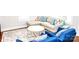 Bright living room with hardwood floors, stylish furniture and a decorative rug at 606 Childs St, Lincolnton, NC 28092