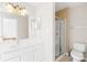 Bathroom featuring a glass enclosed shower, a single sink vanity, and tile flooring at 6418 Castlewynd Ct, Charlotte, NC 28212