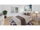 Bright bedroom featuring a plush bed, soft lighting, and a serene atmosphere for relaxation at 6523 Clavell Ln, Charlotte, NC 28210