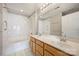 Bathroom with double sink vanity, and shower-tub combination at 718 W Trade St # 708, Charlotte, NC 28202