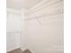 Spacious walk-in closet featuring wire shelving providing ample storage at 718 W Trade St # 708, Charlotte, NC 28202