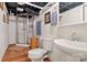 Cozy basement bathroom with a stand up shower and vanity area with a white sink at 8044 Eagle St, Mount Pleasant, NC 28124