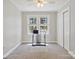 Bedroom with carpet, two windows and a built-in closet at 8044 Eagle St, Mount Pleasant, NC 28124