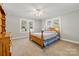 Cozy bedroom with natural light and carpet floors at 8044 Eagle St, Mount Pleasant, NC 28124