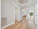 Bright hallway with views into multiple rooms at 8044 Eagle St, Mount Pleasant, NC 28124