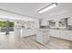 Open-concept kitchen with island and modern countertops at 8044 Eagle St, Mount Pleasant, NC 28124