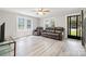 Spacious living room boasts hardwood floors and ample seating at 8044 Eagle St, Mount Pleasant, NC 28124