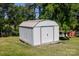 Metal utility shed in the backyard for extra storage, with a single door at 8044 Eagle St, Mount Pleasant, NC 28124