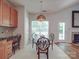 Sunny kitchen and dining area, featuring an eat-in table at 8623 Cedar Hollow Ln, Huntersville, NC 28078