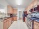 Modern kitchen with stainless steel appliances and ample counter space at 8623 Cedar Hollow Ln, Huntersville, NC 28078