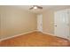 Inviting bedroom with hardwood floors and a closet at 867 Southwest Dr, Davidson, NC 28036