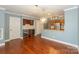 Dining area with hardwood floors, pendant lighting, and convenient access to the kitchen at 867 Southwest Dr, Davidson, NC 28036