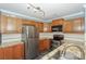 Well-equipped kitchen featuring stainless steel appliances and granite countertops at 867 Southwest Dr, Davidson, NC 28036