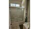 Bathroom featuring shower with glass door at 9535 Potter Rd, Matthews, NC 28104