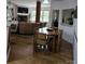 Cozy dining area adjacent to the kitchen, featuring hardwood floors and an open concept layout at 9535 Potter Rd, Matthews, NC 28104