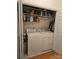 Convenient laundry closet with washer and dryer hookups at 9535 Potter Rd, Matthews, NC 28104