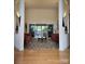 Spacious living room featuring high ceilings, wood floors, and access to outdoor living space at 9535 Potter Rd, Matthews, NC 28104