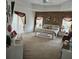 Spacious main bedroom featuring tray ceilings, large windows, and decorative details at 9535 Potter Rd, Matthews, NC 28104