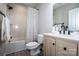 Full bathroom with a shower and tub combination, featuring a light wood vanity at 9860 Darby Creek Nw Ave, Concord, NC 28027