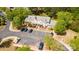 Overhead view of townhomes with parking, surrounded by trees, offering a suburban lifestyle at 1032 Eagles Nest Ln, Indian Land, SC 29707