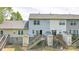 Aerial view of the back of the home featuring decks, sheds, and lush yard at 1032 Eagles Nest Ln, Indian Land, SC 29707
