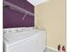Laundry room with overhead shelving and side-by-side washer and dryer at 1032 Eagles Nest Ln, Indian Land, SC 29707