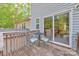 A deck with seating near the home's sliding glass door at 1032 Eagles Nest Ln, Indian Land, SC 29707