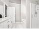 Bright bathroom with a glass-enclosed shower, vanity, and a separate bathtub at 11312 Fox Hill Dr, Charlotte, NC 28269