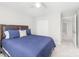 Comfortable bedroom with a blue bedspread and a double-door closet at 11312 Fox Hill Dr, Charlotte, NC 28269