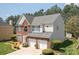 Well-maintained two-story home with brick accents, neutral siding and a two-car garage at 11312 Fox Hill Dr, Charlotte, NC 28269