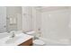 Clean bathroom featuring a combined tub and shower, with a modern vanity and neutral colors at 117 Pine Lake Dr, Monroe, NC 28110