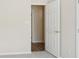 A neutrally painted bedroom offers carpeted floors and natural light at 117 Pine Lake Dr, Monroe, NC 28110