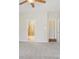 Carpeted bedroom showcasing access to bathroom and closet at 117 Pine Lake Dr, Monroe, NC 28110