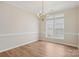 Bright dining room featuring hardwood floors and large window at 117 Pine Lake Dr, Monroe, NC 28110