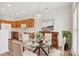 Cozy kitchen dining area featuring a glass-topped table and a blend of modern appliances with traditional touches at 117 Pine Lake Dr, Monroe, NC 28110