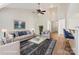 Inviting living room featuring high ceilings, stylish furniture, and a calming blue-themed decor for a serene atmosphere at 117 Pine Lake Dr, Monroe, NC 28110