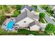 Aerial view of house with pool, patio, privacy fence, landscaping, and backyard shed at 1215 39Th Ne Ave, Hickory, NC 28601