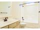 Bathroom features shower-tub combo and single sink vanity at 1215 39Th Ne Ave, Hickory, NC 28601