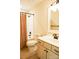 Bathroom with neutral walls, tile floor, vanity, toilet and shower at 1215 39Th Ne Ave, Hickory, NC 28601