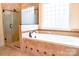Beautiful bathroom featuring soaking tub and glass-enclosed shower at 1215 39Th Ne Ave, Hickory, NC 28601