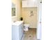 Pool side bathroom featuring gray vanity with white countertops, toilet, and storage at 1215 39Th Ne Ave, Hickory, NC 28601